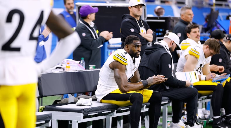 Pittsburgh Steelers' DK Metcalf sits on the bench during the second half of an NFL football game against the Detroit Lions, Sunday, Dec. 21, 2025, in Detroit. (AP Photo/Rey Del Rio)