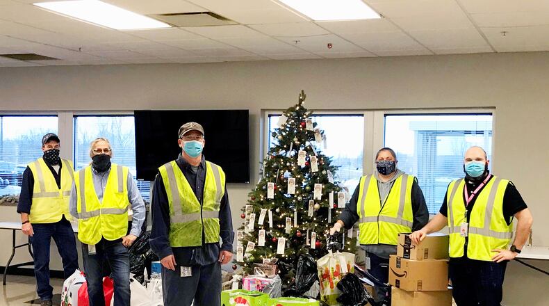 Silfex employees in Springfield collected toys, clothes and other gifts for local kids as part of the Salvation Army’s Angel Tree program in December. From L to R: Mark Nagel, Steve Estep, Tyler Weiss, Colleen Friedsberg and Kyle Lacey