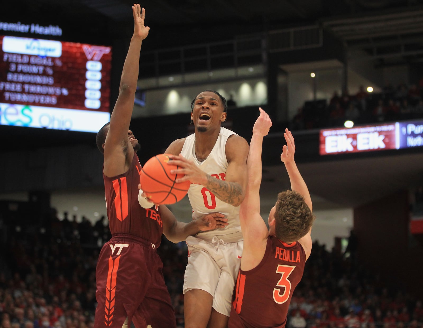 Dayton's Elijah Weaver looks for a shot against Virginia Tech on Sunday, Dec. 12, 2021, at UD Arena. David Jablonski/Staff