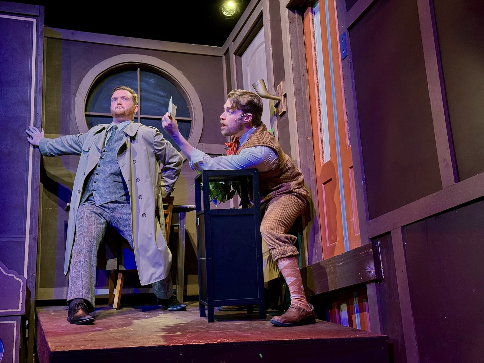 Dylan Jackson (left as Chris/Inspector Carter) and Montana Iverson (Robert/Thomas Colleymore) in La Comedia Dinner Theatre's production of "The Play That Goes Wrong." Photo by Justin Walton