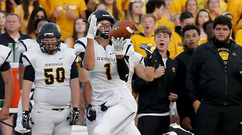 Centerville wide receiver Jake Spiewak catches a pass and runs for an 80-yard touchdown against Fairfield during the Elks’ 30-23 victory Friday night in the Skyline Chili Crosstown Showdown at Fairfield Stadium. CONTRIBUTED PHOTO BY E.L. HUBBARD