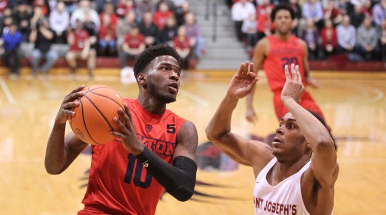 Dayton's Jalen Crutcher looks for a shot in the first half against St. Joseph's on Wednesday, Jan. 17, 2018, at Hagan Arena in Philadelphia.