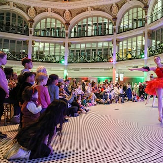 Miami Valley Dance Company dancers perform during Holly Days at Dayton Arcade on Thursday, Dec. 11. BRYANT BILLING/STAFF