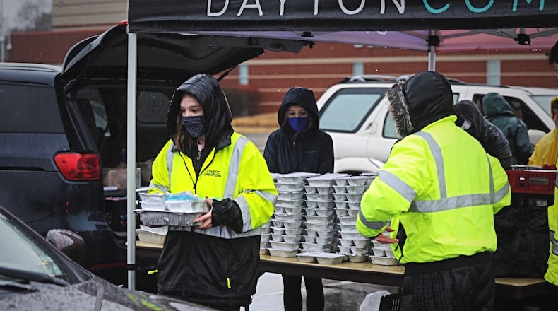 Miami Valley Meals, with support of the MVM Coalition, is holding two turkey dinner takeaway distribution sites on Wednesday, Nov. 25, 2020, from 9 a.m. to noon. The distribution sites will be held at the University of Dayton Arena and Trotwood Madison High School. MARSHALL GORBY\STAFF