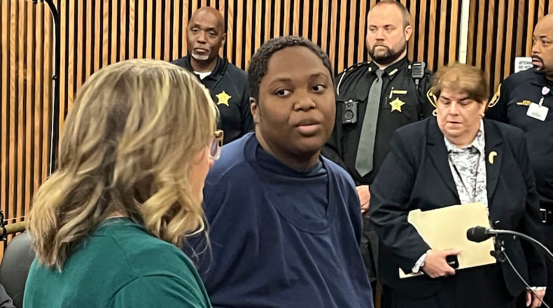 FILE - Bionca Ellis, 32, center right, appears in the Cuyahoga County Common Pleas court, June 10, 2024, in Cleveland, in the stabbing death of 3-year-old Julian Wood in a grocery store parking lot in June. (Cory Shaffer/Cleveland.com via AP, File)
