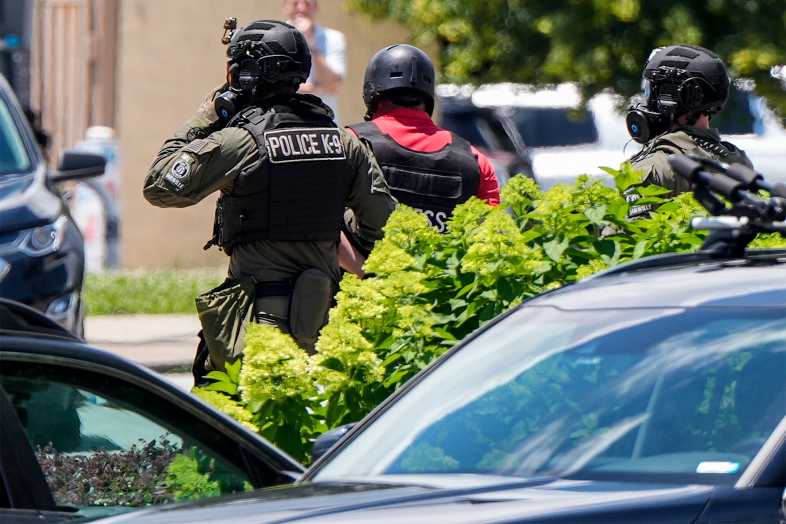 Mario Guevara with MGNews is detained by Dekalb County Sheriff's depurties in Dekalb County, during a No Kings Day protest near Atlanta, on Saturday, June 14, 2025/ (AP Photo/Mike Stewart)