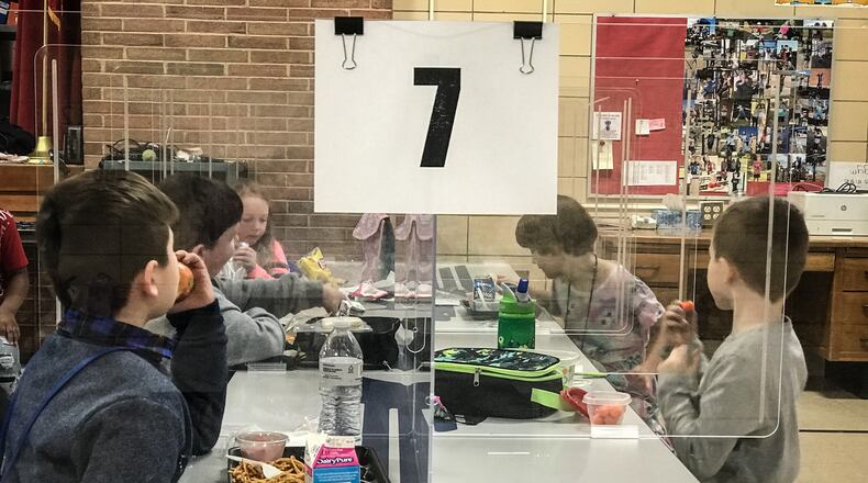 Plastic dividers, cleaning supplies and extra staff to deal with COVID-19 cost many local schools extra money in 2020-21.