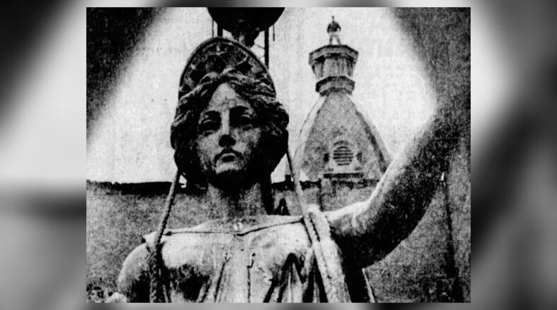 A statue representing the Goddess of Liberty was originally placed atop the Gebhart Opera House the July 3, 1879.