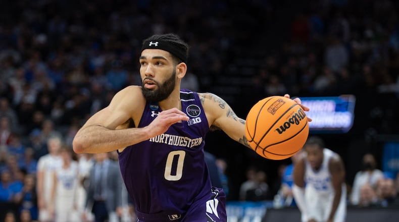 Northwestern guard Boo Buie (0) drives to the basket during the second half of the team's second-round college basketball game against UCLA in the men's NCAA Tournament, Saturday, March 18, 2023, in Sacramento, Calif. UCLA won 68-63. (AP Photo/José Luis Villegas)