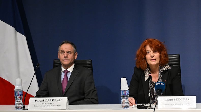 Head of the brigand of banditry repression Pascal Carreau, left, and Paris prosecutor Laure Beccuau speaks attend a news conference at the Paris courthouse Wednesday, Oct. 29, 2025, on the judicial investigation into the jewels robbery at the Louvre museum in Paris, France. (AP Photo/Emma Da Silva)