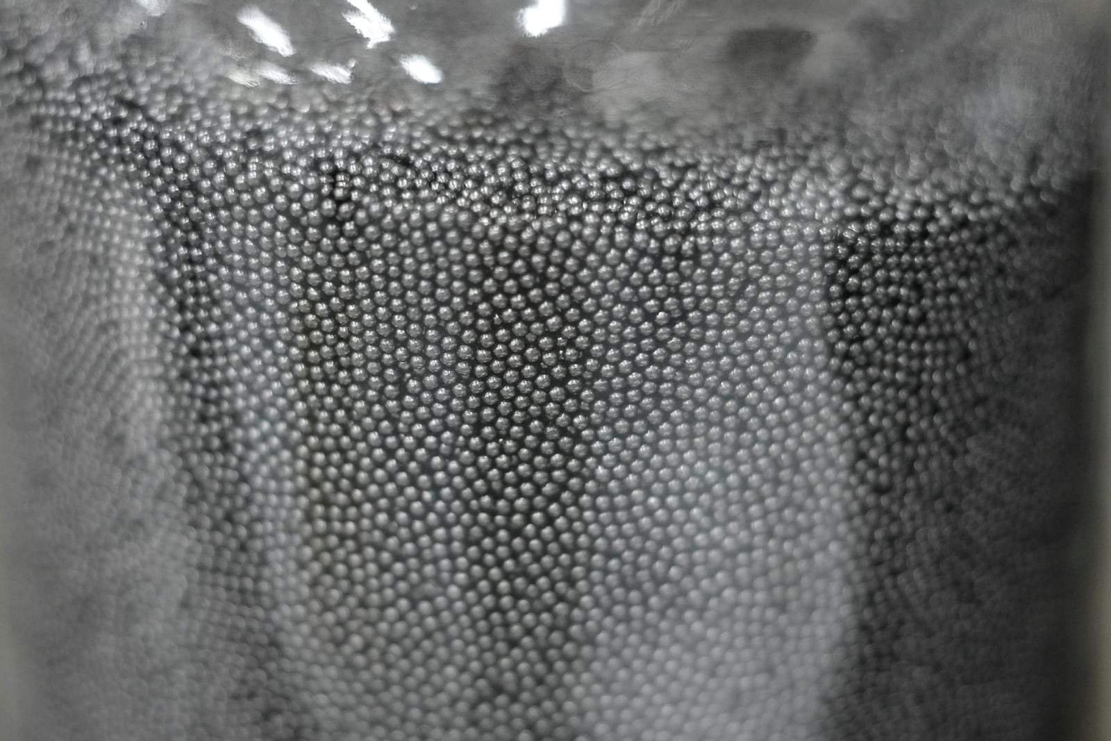 Uranium kernels wrapped in three alternating layers of pyrolytic carbon and silicon carbide used for the manufacture of TRISO fuel are visible on Friday, June 27, 2025, in Oak Ridge, Tenn. (AP Photo/George Walker IV)