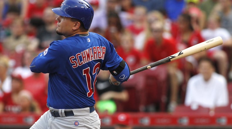 The Cubs’ Kyle Schwarber singles in the first inning against the Reds on Monday, July 20, 2015, at Great American Ball Park in Cincinnati. DAVID JABLONSKI/STAFF