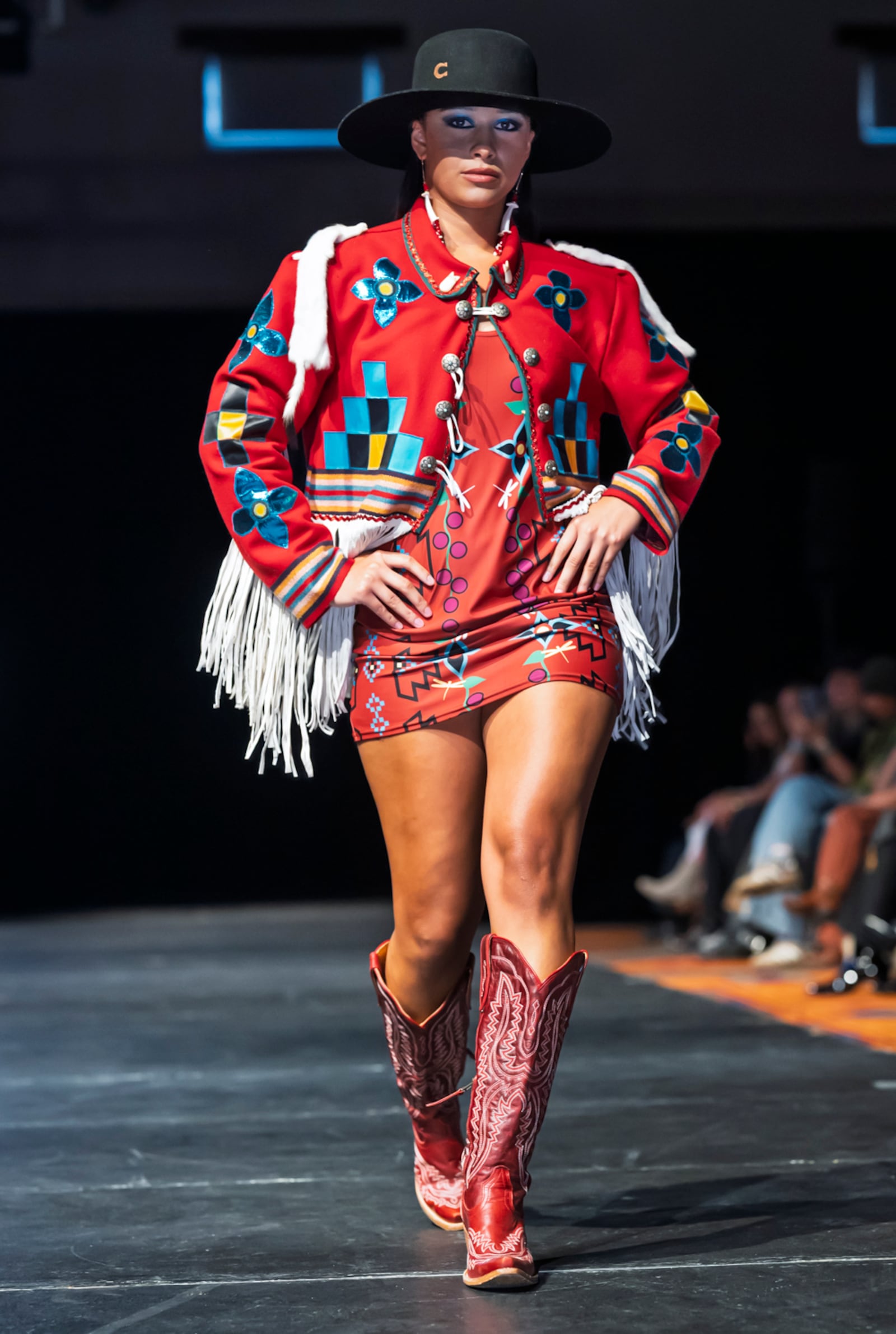 A model wears a design by Livia Manywounds on the runway at the 2025 Native Fashion Show, Friday, May 9, 2025, in Santa Fe, N.M. (AP Photo/Roberto E. Rosales)