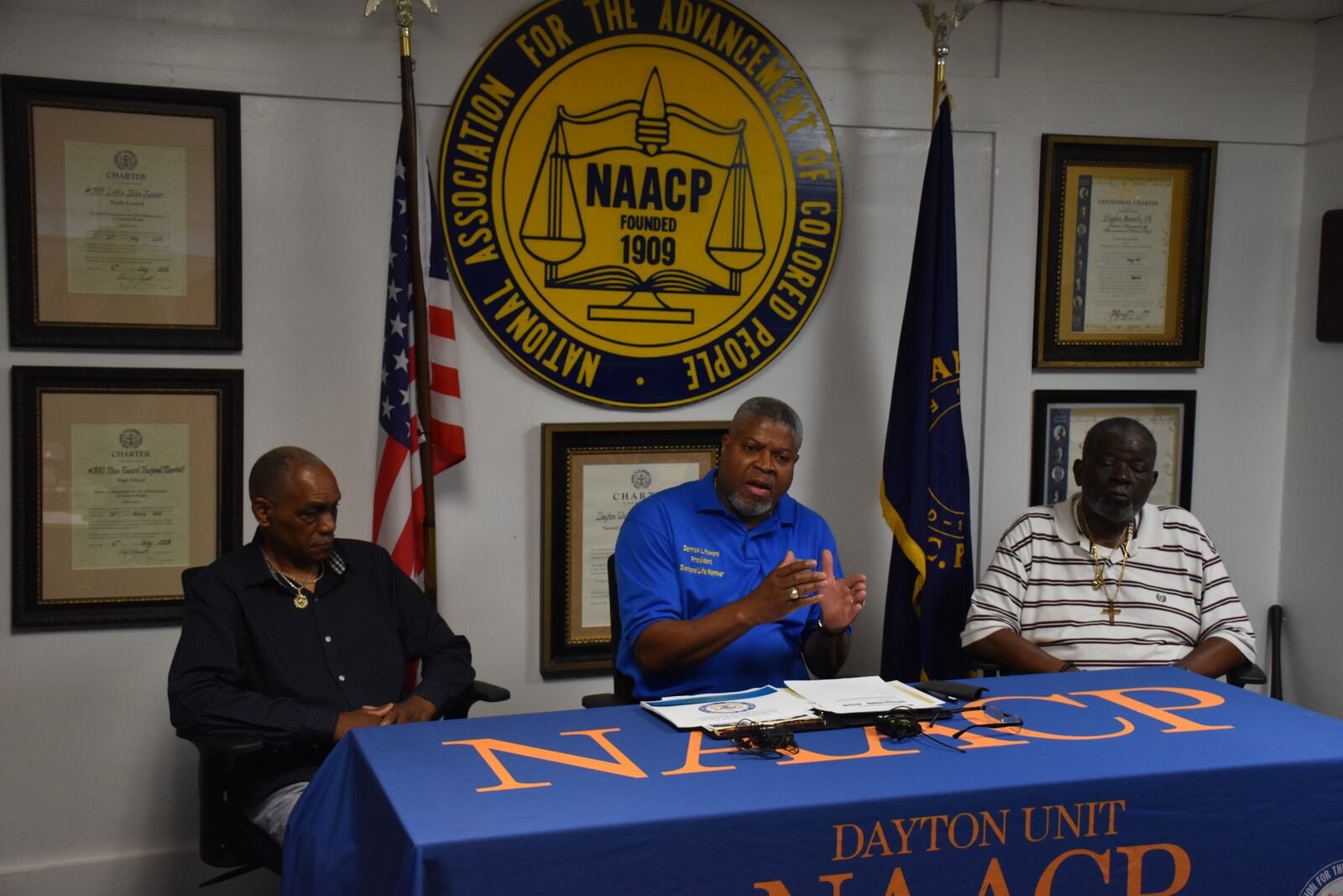 Leaders with the NAACP Dayton branch speak about gun violence in the community on Friday, June 13, 2025. From left, David Fox, President Derrick Foward and David Greer. CORNELIUS FROLIK / STAFF