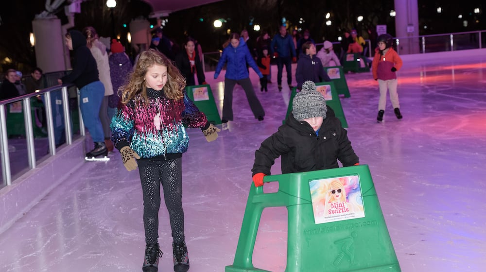 Five Rivers MetroParks hosted the Swiftie Skate Night at the MetroParks Ice Rink, located at RiverScape MetroPark in downtown Dayton on Friday, Feb. 20, 2026. Attendees enjoyed the music of Taylor Swift while skating. The ice rink is open daily until Feb. 27 (weather permitting). TOM GILLIAM / CONTRIBUTING PHOTOGRAPHER