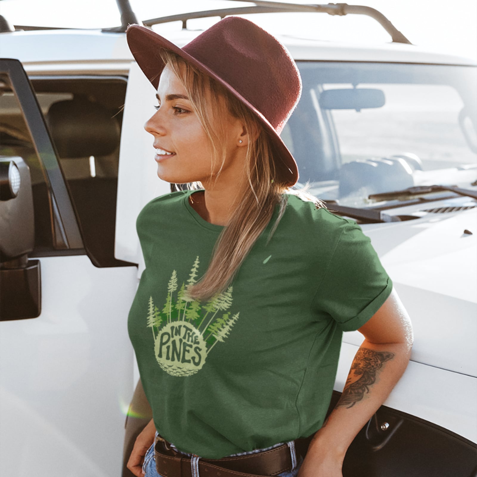 A model wearing a Two Trails t-shirt. The designs often incorporate imagery from Moe Capretta and Jerrod Claytor's own nature adventures. CONTRIBUTED