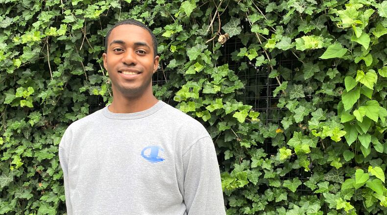 Alexander Joseph is a 2022 DECA graduate headed to University of Dayton on a Flyer Promise scholarship to study engineering. The son of immigrants from Sierra Leone and the Pacific Isles, he has made himself into a leader in his school. Eileen McClory/ Staff