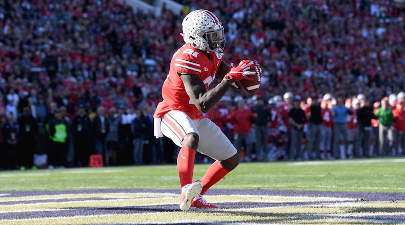 PASADENA, CA - JANUARY 01: Parris Campbell #21 of the Ohio State Buckeyes catches a touchdown during the first half in the Rose Bowl Game presented by Northwestern Mutual at the Rose Bowl on January 1, 2019 in Pasadena, California. (Photo by Harry How/Getty Images)