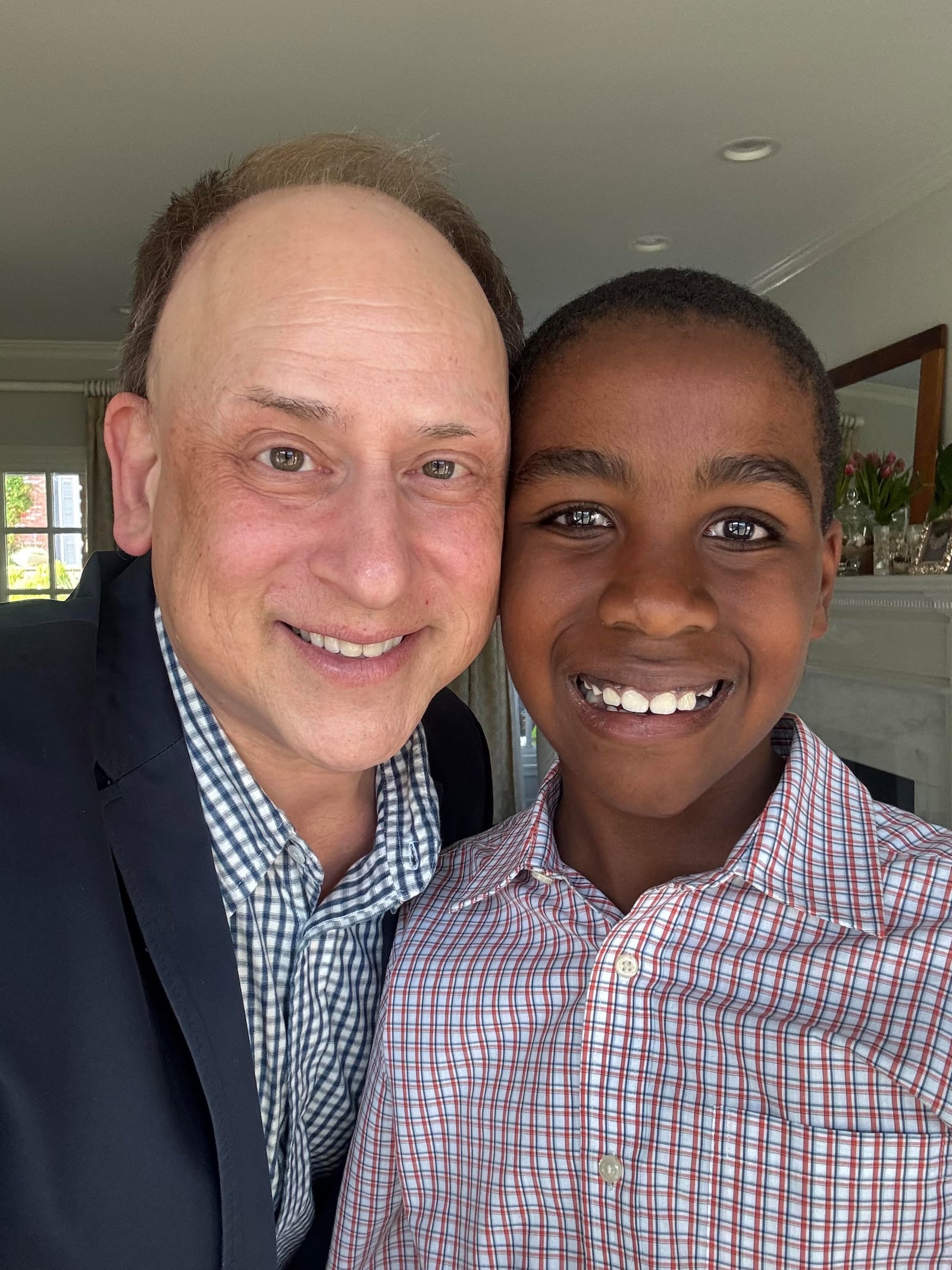 Adam Kulbersh, founder of Project Menorah, is pictured with his son, Jack. CONTRIBUTED
