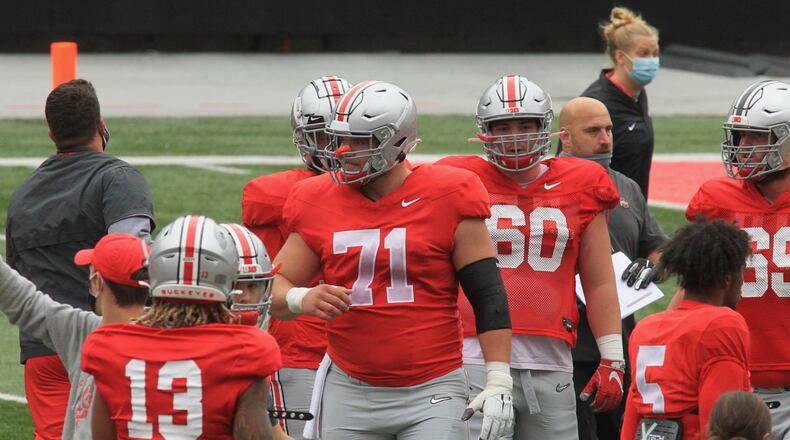 Ohio State players, including Josh Myers (71), practice at Ohio Stadium on Saturday, Oct. 3, 2020, in Columbus. David Jablonski/Staff