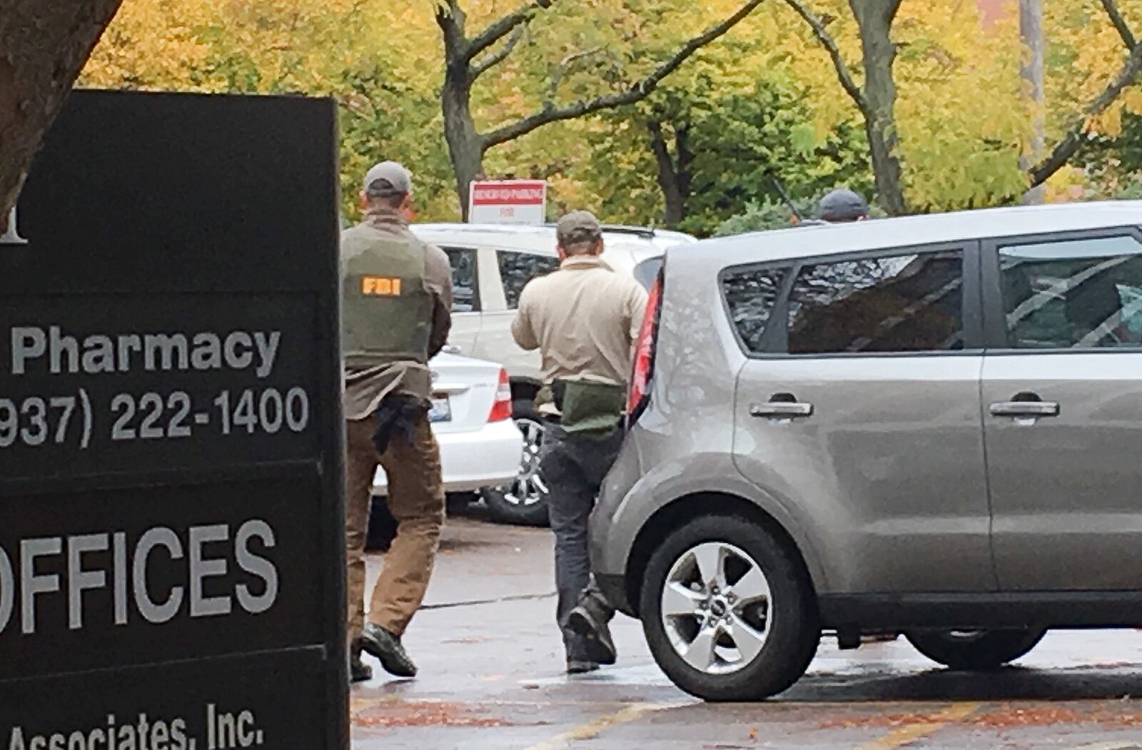 Federal agents in 2017 raid the Dayton Primary and Urgent Care Center Inc. at 301 W. First St. in Dayton. Five defendants involved with business have been indicted as part of the largest prescription opioid takedown in U.S. history, according to federal officials. Morris Brown, Ismail Abuhanieh, Mahmoud Elmiari, Mahmoud Rifai and Yohannes Tinsae are all named in a federal indictment filed in the Southern District of Ohio U.S. District Court. MIKE CAMPBELL / STAFF