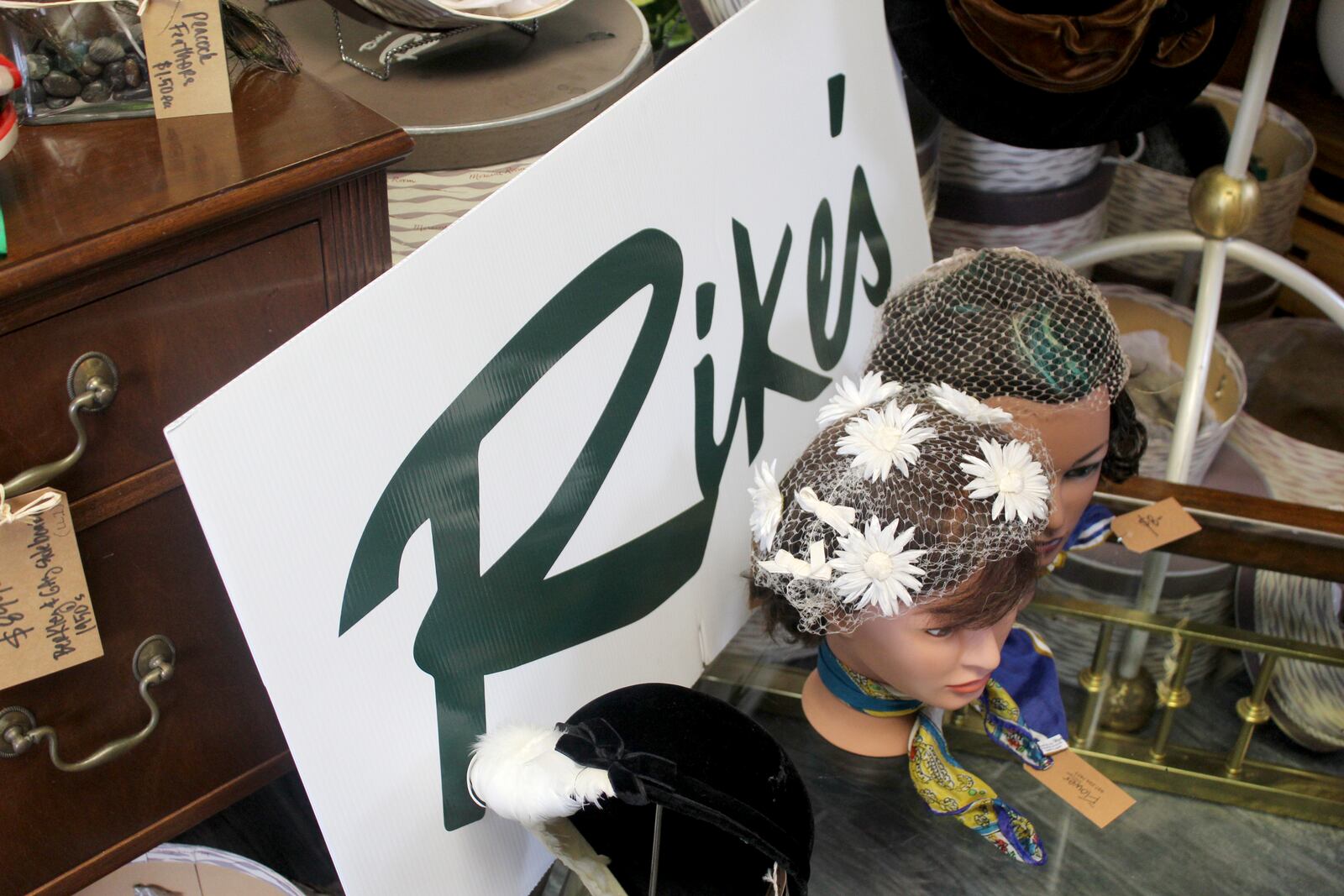 Vintage hats and hat boxes from from the former Rike’s Department store in downtown Dayton are being sold at The Flower Shoppe in Oakwood. Owner Mark Brueninghaus said the hats with a hat box range from about $45 to $95.