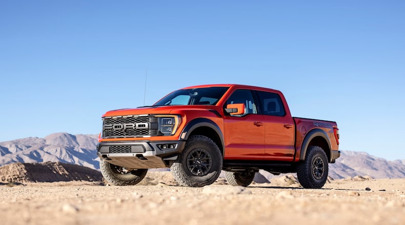 This photo provided by Ford Motor Company shows the 2021 Ford F-150 Raptor. More than just an upgraded F-150, the Raptor is a re-worked version of the full-size pickup truck that has a go-anywhere, do-anything attitude. (Courtesy of Ford Motor Co. via AP)