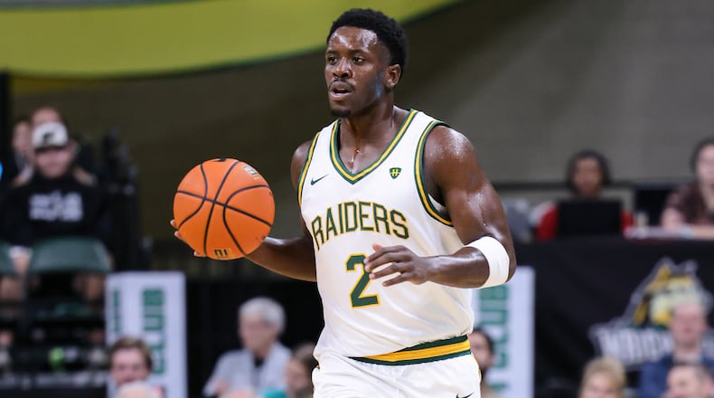 Wright State graduate guard Sam Alamutu dribbles during an 86-37 win over Franklin College 86-37 in a season opener on Monday, Nov. 3 at Ervin J. Nutter Center in Fairborn. BRYANT BILLING/STAFF