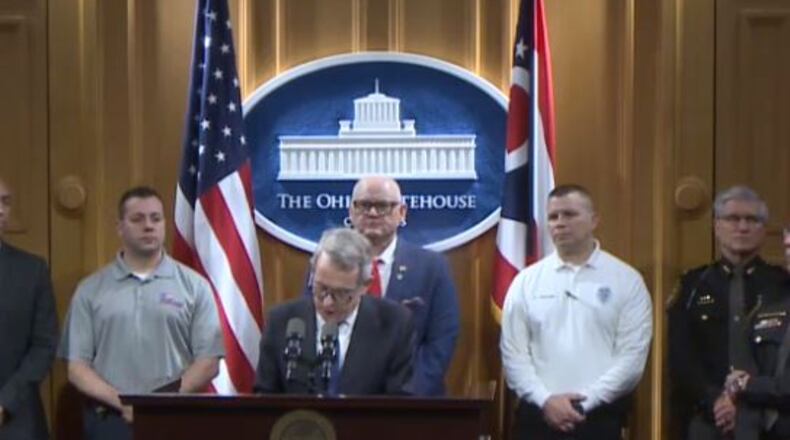 Warren County Sheriff Larry Sims (at right) was in Columbus Monday as Gov. Mike DeWine announced that the Greater Warren County Drug Task Force was awarded $50,030 from the RecoveryOhio Law Enforcement Fund.