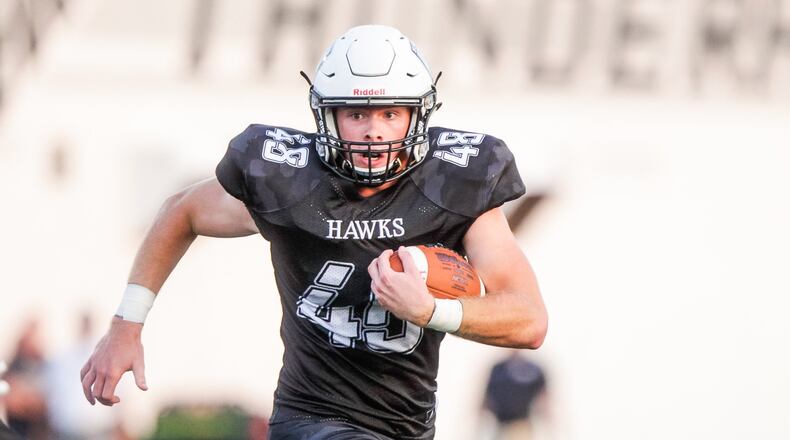 Lakota East's Charlie Kenrich carries the football during their game against Middletown Friday, Sept. 20, 2019 at Lakota East High School in Liberty Township. Lakota East defeated Middletown 21-9. NICK GRAHAM/STAFF