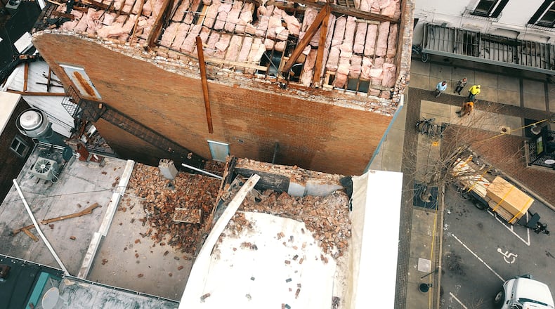 Buildings on Troy's downtown square, including the buildings near North Market and Main streets that house Ruby's Beauty Salon and Thrush and Son Complete Home Improvement were heavily damaged in a January 2020 tornado. LISA POWELL / STAFF