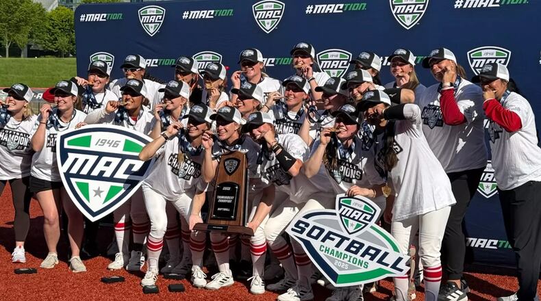 The Miami University softball team poses for pictures after winning the Mid-American Conference Tournament this past weekend. The RedHawks will compete in their fifth-straight NCAA Tournament. MIAMI ATHLETICS / CONTRIBUTED