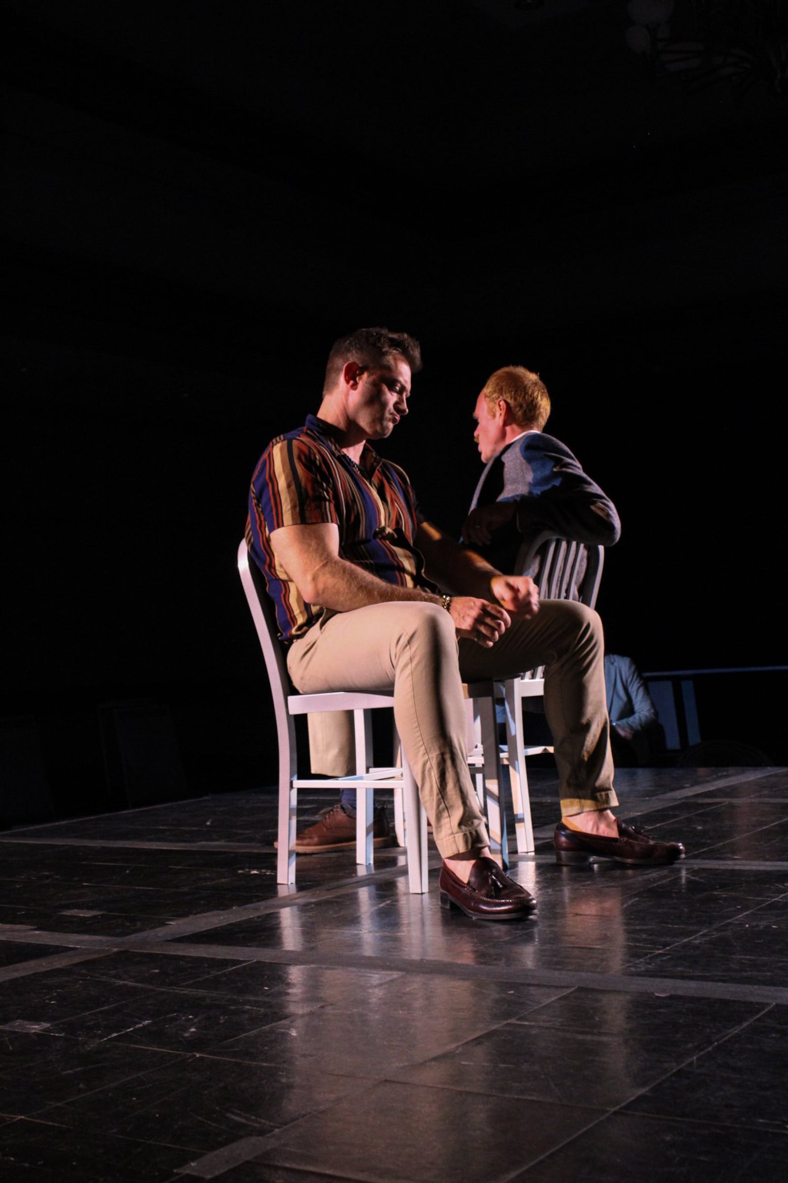Andrew Mitakides (left, Denny) and Ryan Hester (Joey) in Gem City Groundlings presentation of "A Steady Rain." Photo by Tris Greys Photos