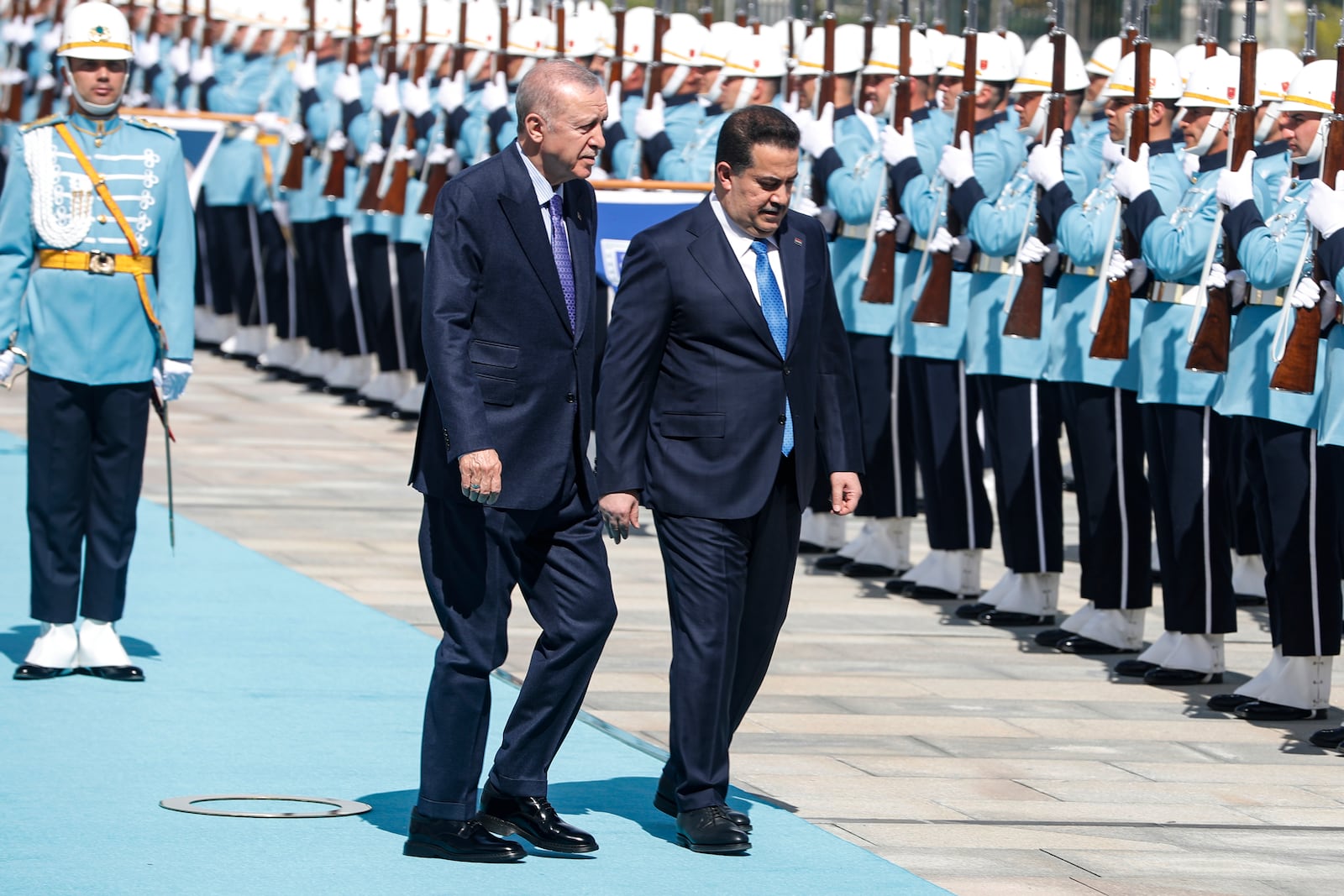 Turkish President Recep Tayyip Erdogan, left, rand Iraq's Prime Minister Mohammed Shia al-Sudani review honor guards during the latter's official visit to Turkey, in Ankara on Thursday, May 8, 2025. (Ahmad Al-Rubaye /Pool Photo via AP,)