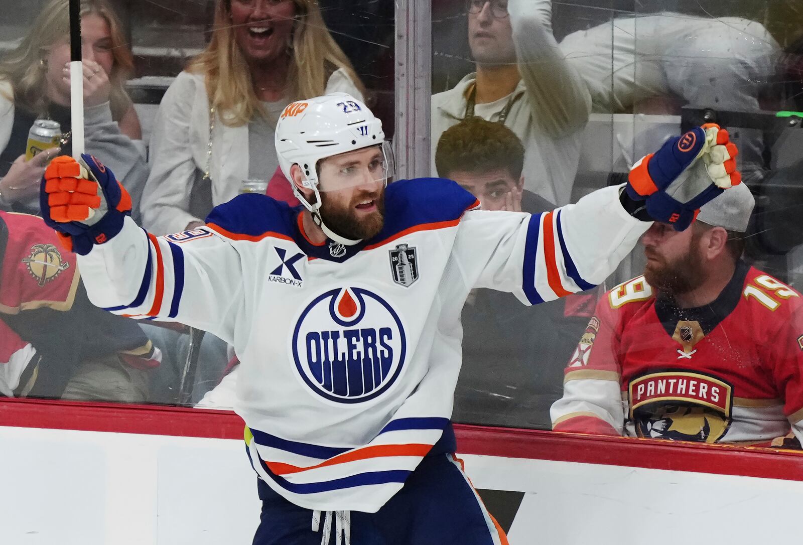 Edmonton Oilers' Leon Draisaitl (29) celebrates after his winning goal against the Florida Panthers during the first overtime period in Game 4 of the NHL hockey Stanley Cup Final in Sunrise, Fla., Thursday, June 12, 2025. (Nathan Denette/The Canadian Press via AP)