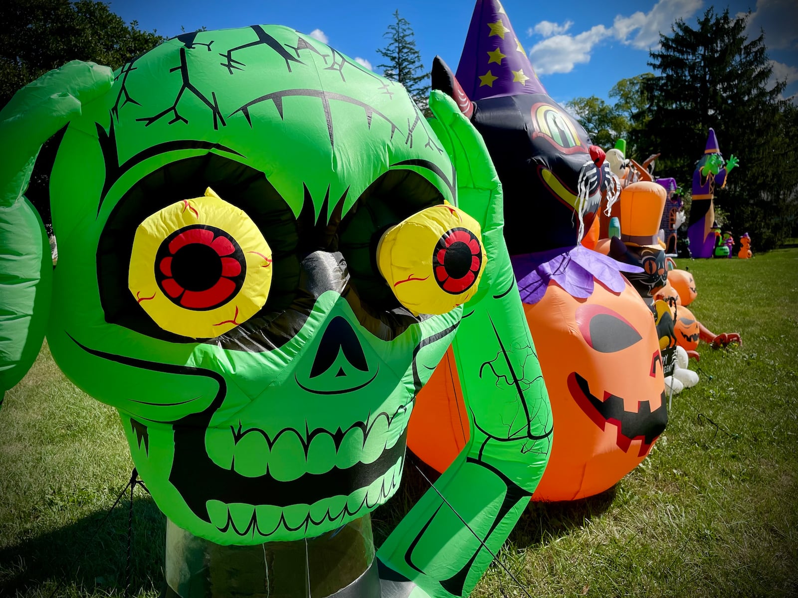 A Centerville home at the corner of Cable Court and Maltbie Road, behind the high school,  has 51 inflatables and 8 skeleton scenes spread throughout the yard for Halloween. NATALIE JONES/STAFF
