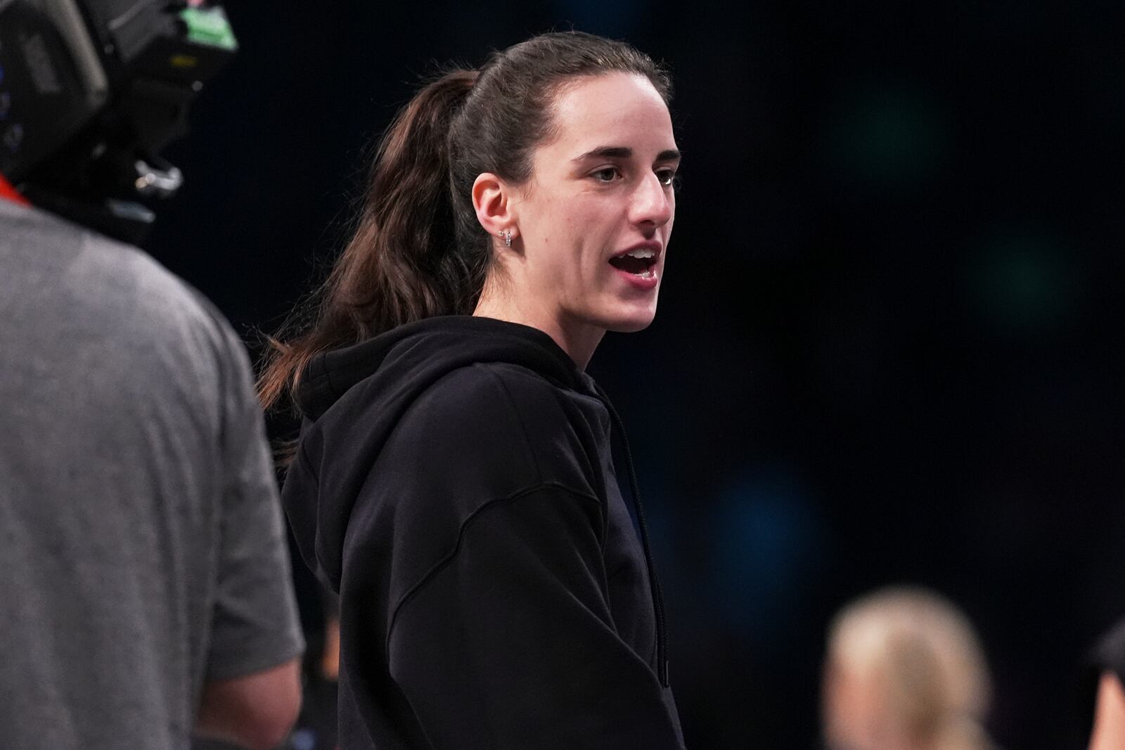 Indiana Fever's Caitlin Clark talks to fans before a WNBA basketball game against the New York Liberty Wednesday, July 16, 2025, in New York. (AP Photo/Frank Franklin II)