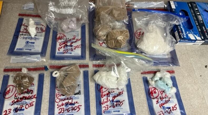 Fentanyl, heroin, methamphetamine, cash and a firearm were seized Thursday, Aug. 3, 2023, from a house in the 4000 block of Benton Drive in Trotwood. CONTRIBUTED