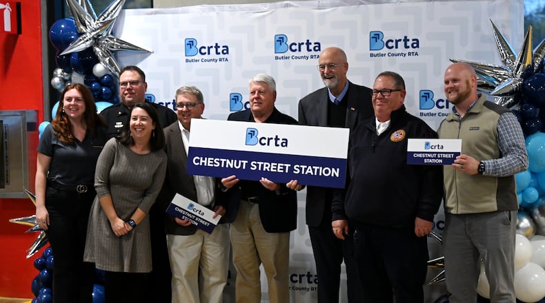 Pictured are a contingent of city of Oxford representatives at the Butler County Regional Transit Authority's grand opening of the new Chestnut Street Multimodal Station. The Butler County RTA held a grand opening celebration on Thursday, Nov. 6, 2025, for the new station in Oxford, Ohio, which will also be home to a new Amtrak Cardinal line stop scheduled to be operational in 2026. MICHAEL D. PITMAN/STAFF