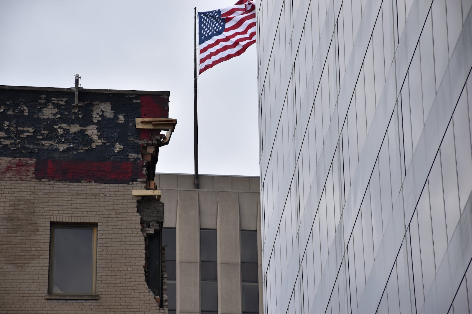 Part of the building at 34 N. Main St. in downtown Dayton collapsed during high winds in March 2025. The city of Dayton has approved funding for emergency stabilization work and plans to replace the roof. CORNELIUS FROLIK / STAFF