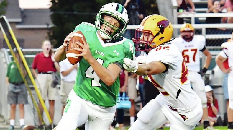 Anna High School senior QB Bart Bixler ranks in the top three for rushing and touchdowns in the Midwest Athletic Conference. JASON ALIG / SIDNEY DAILY NEWS