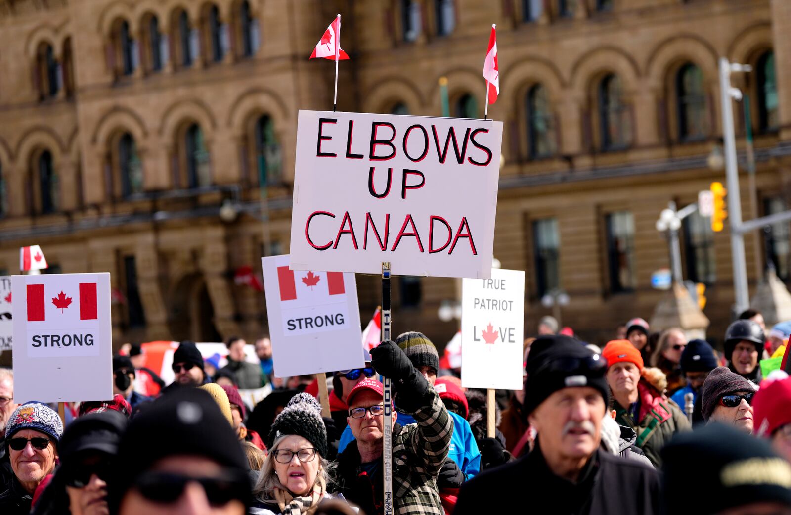 FILE - People rally in response to U.S. President Donald Trump's threats to Canadian sovereignty on Parliament Hill in Ottawa, March 9, 2025. (Justin Tang/The Canadian Press via AP, File)