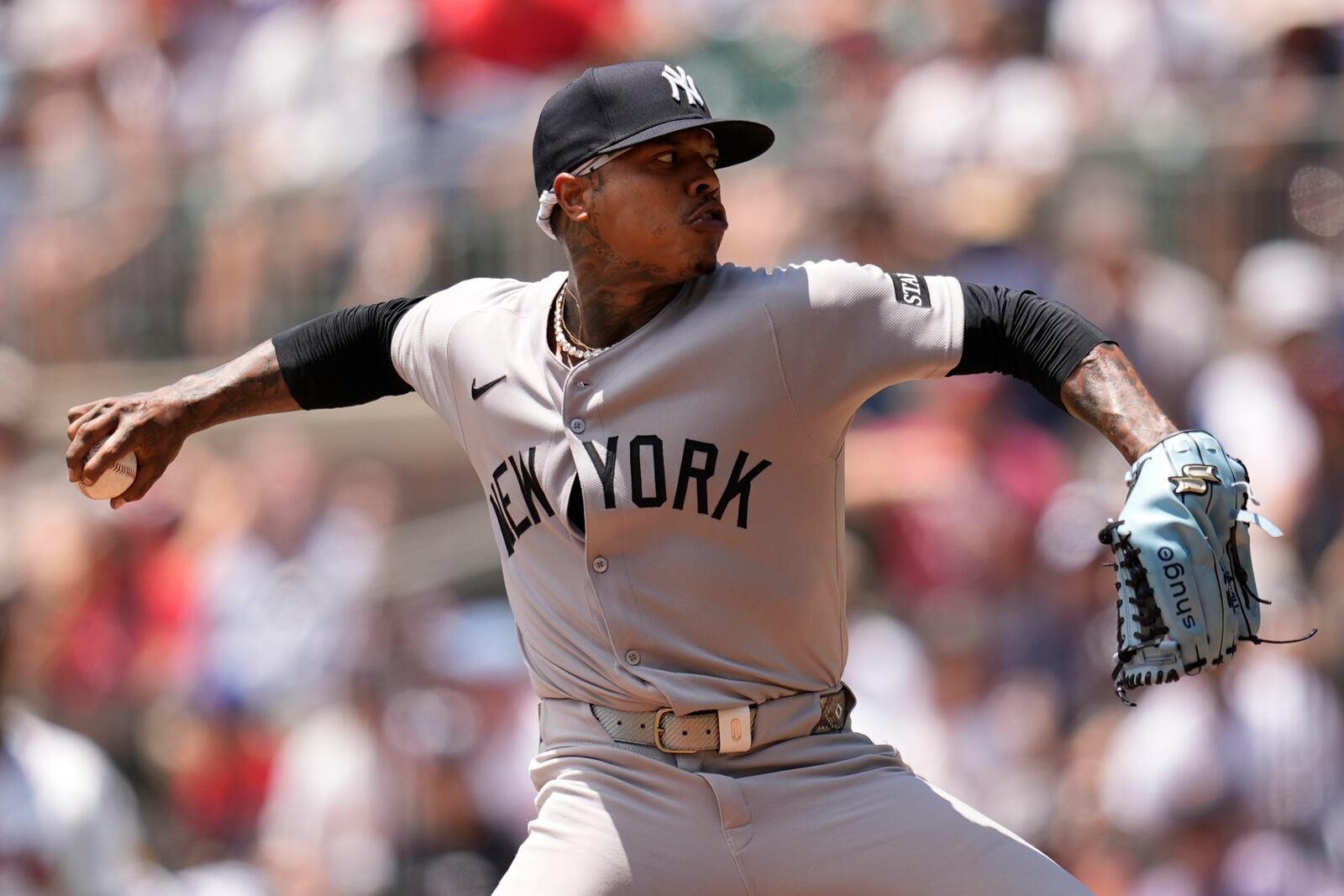 New York Yankees pitcher Marcus Stroman (0) works against the Atlanta Braves in the first inning of a baseball game, Sunday, July 20, 2025, in Atlanta. (AP Photo/Mike Stewart)