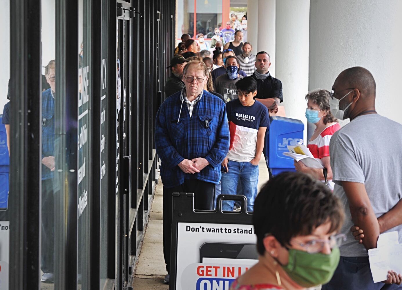 PHOTOS: Long lines as state BMV offices reopen after coronavirus shutdowns