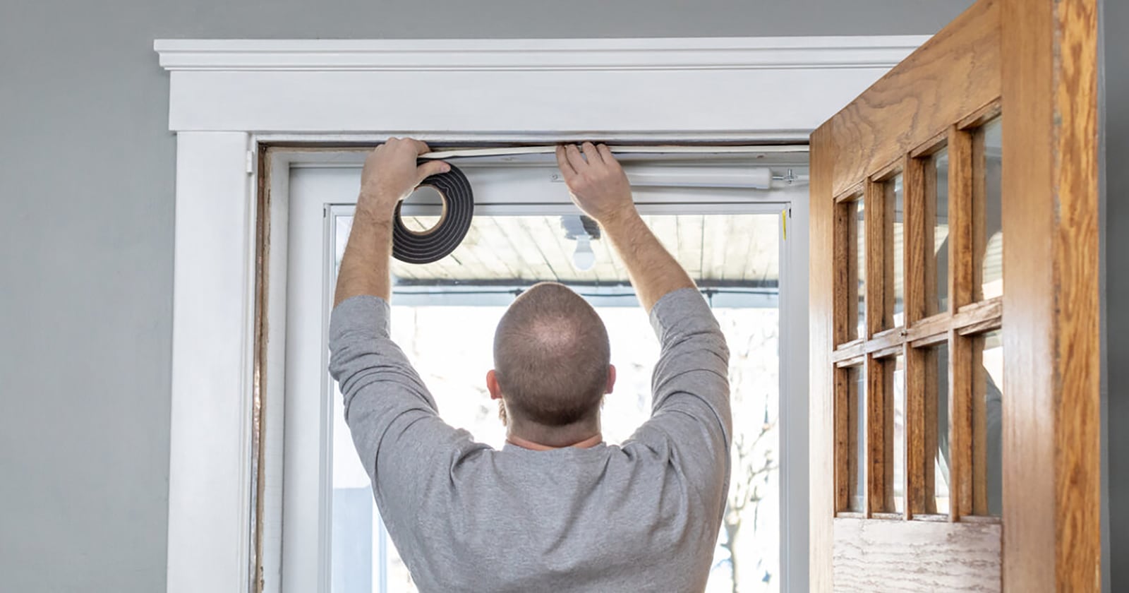 Installing weather stripping around leaky doors and windows can help keep homes toasty warm in winter and prevent warm air from escaping to the outside. FILE