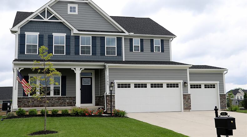 The concrete and fiber-board home has about 3,620 sq. ft. of living space, including a finished basement with an egress window. The home includes a 3-car garage, a rear deck and fenced back yard. The Oak Brooke neighborhood is across the street from Sweet Arrow Reserve. CONTRIBUTED PHOTO BY KATHY TYLER
