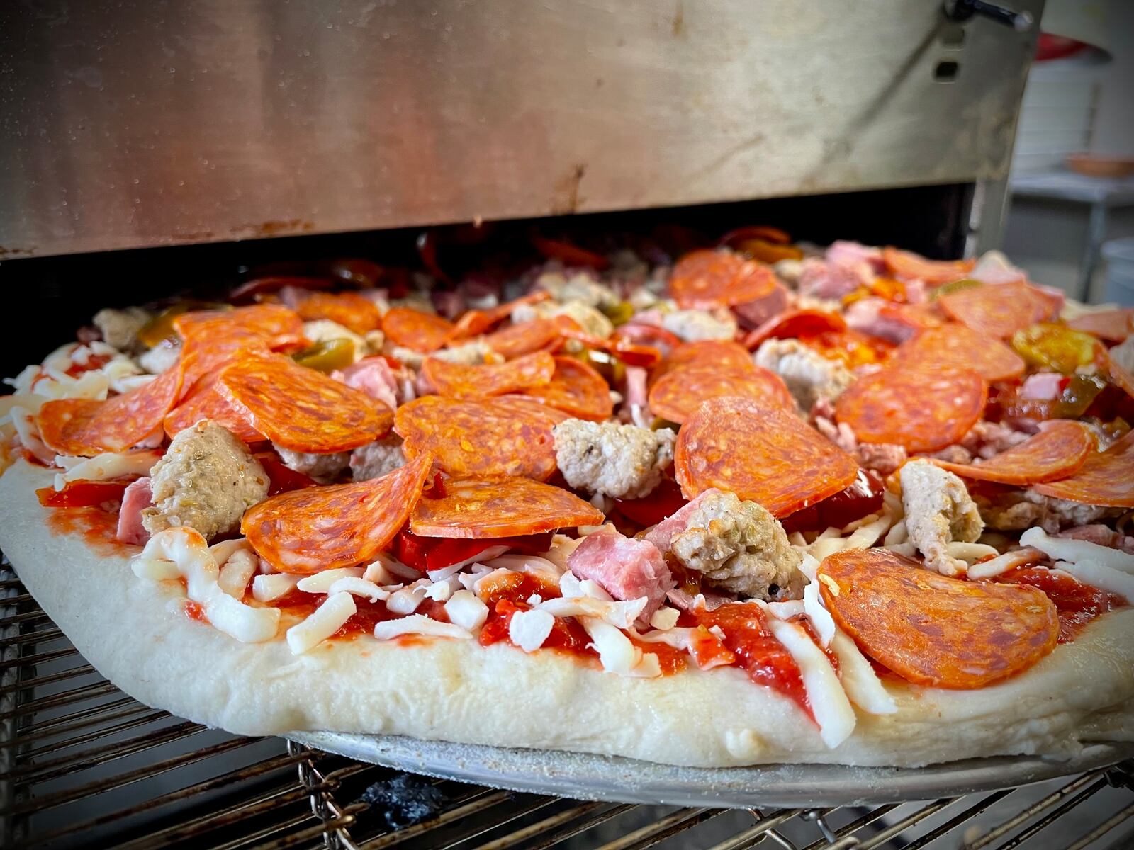 After closing their doors for a month, Owners Sherri and Steve Zelen have reopened Old Dayton Pizza at Riverside Hideaway on Old Troy Pike. NATALIE JONES/STAFF