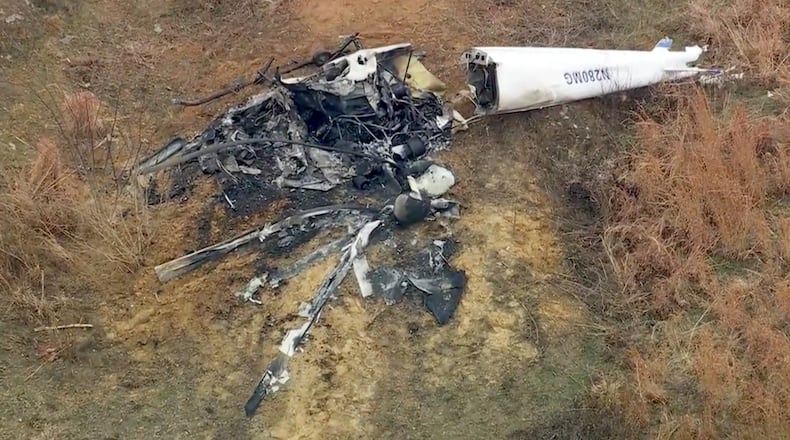 Debris from a helicopter is shown after two helicopters crashed in Hammonton, N.J., on Sunday, Dec. 28, 2025. (WPVI-TV/6ABC via AP)