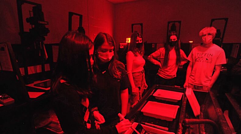Beavercreek High School students work in a photo darkroom on Oct. 8, 2020.
