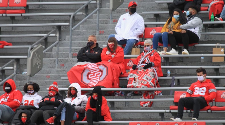 Josh Myers' family, center, sits in the stands at Ohio Stadium during a game against Nebraska on Saturday, Oct. 24, 2020, in Columbus. David Jablonski/Staff